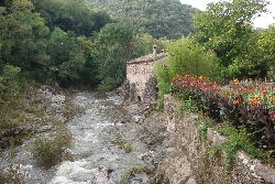 Le Moulin vu du pont de la Dorelle